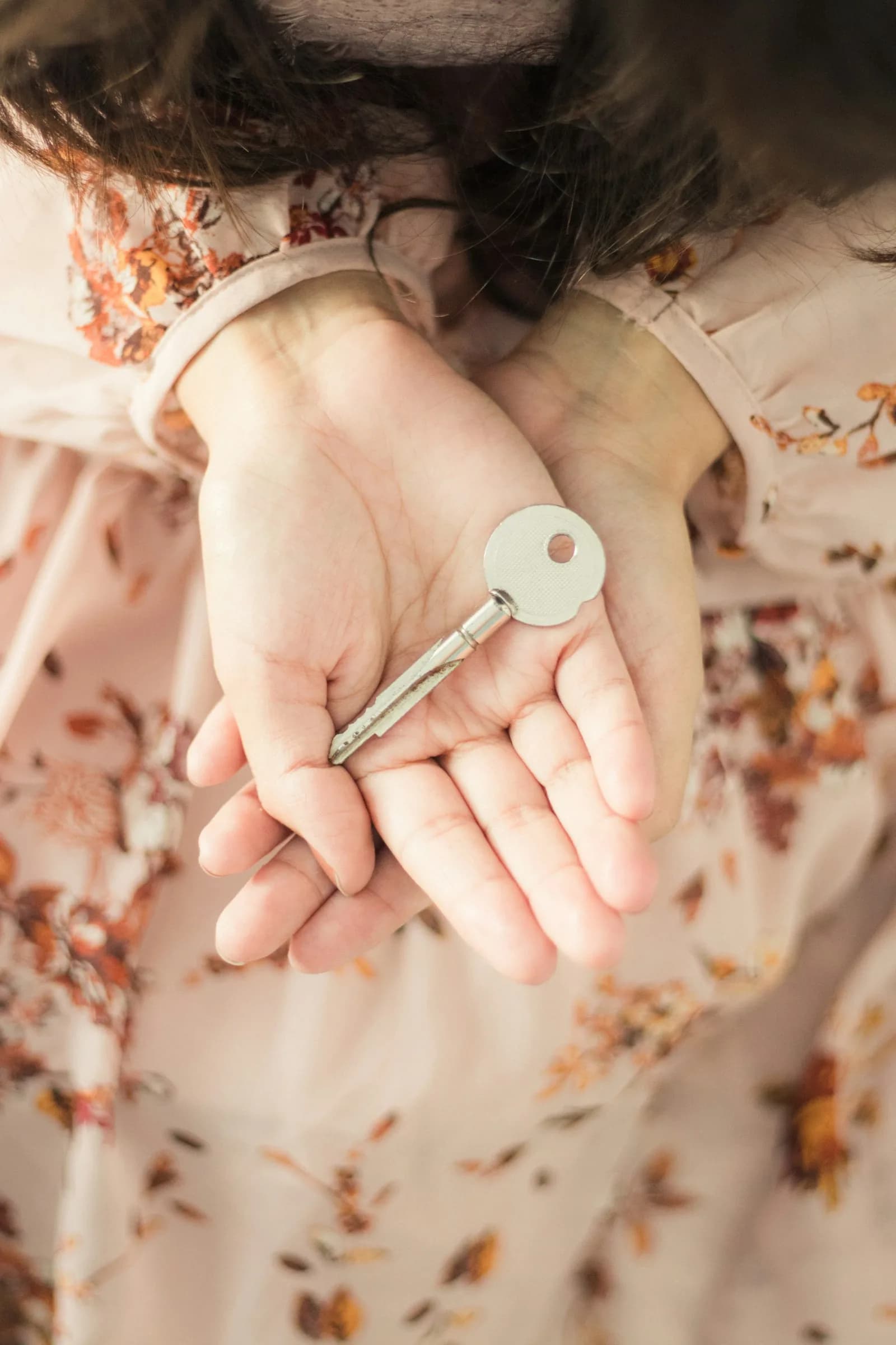House keys in the palm of a hand